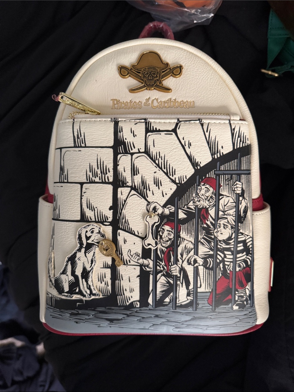 Loungefly White Pirates of the Caribbean Backpack with Red Accents